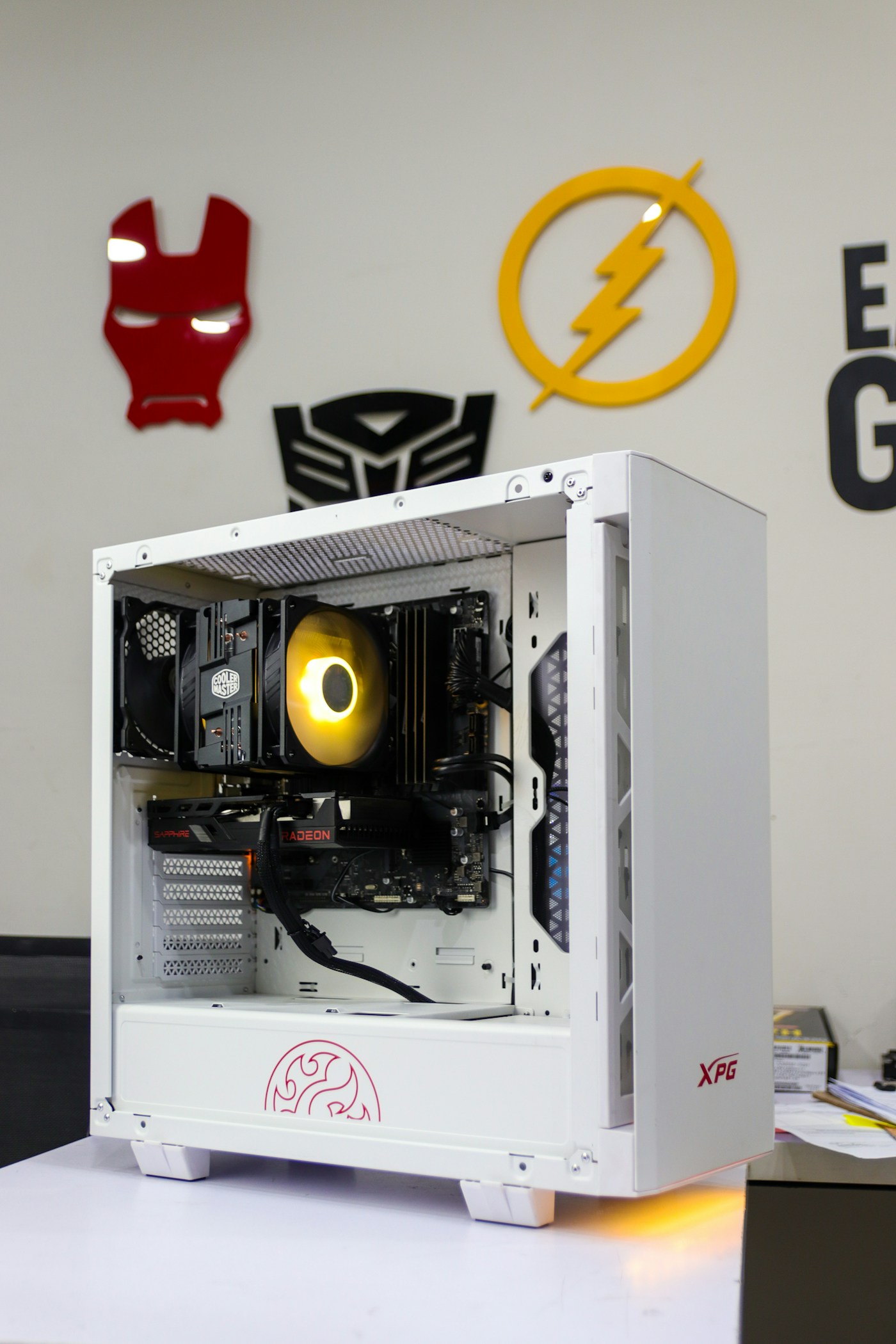 White gaming PC tower with the side panel off