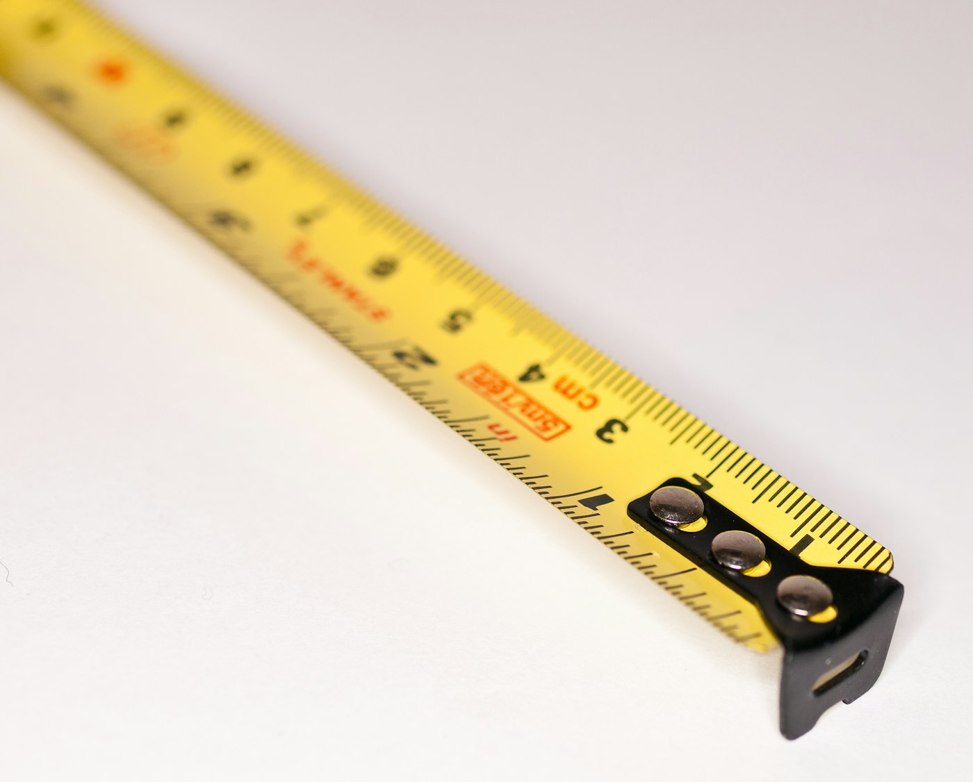 Yellow retractable tape measure